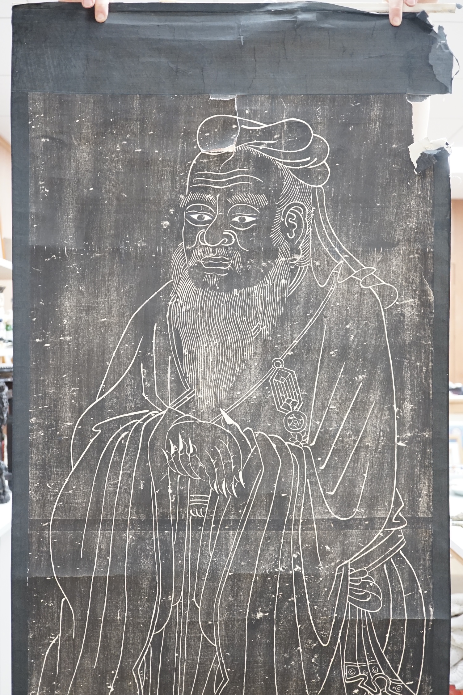 A Chinese scroll painting and scroll rubbing. Condition - poor